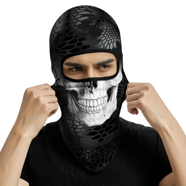 cagoule-moto-halloween-skull-citrouille-coolmax.webp Alt Image : cagoule moto Halloween motifs tête de mort et citrouille respirante